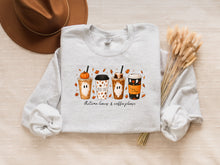 Load image into Gallery viewer, Women's autumn sweatshirt featuring cute ghost coffee cups, pumpkin spice drinks, fall leaves, and seasonal coffee artwork, perfect for pumpkin patch outings and cozy fall fashion.