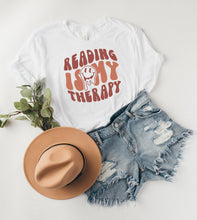 Load image into Gallery viewer, Reading Is My Therapy Graphic Tee
